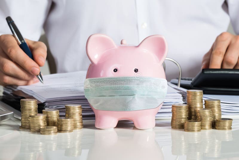 Piggybank With Face Mask Near Accountant