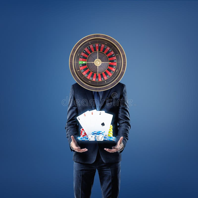 A businessman with a casino roulette instead of his head stands and offers cards, dice and casino chips. stock images A businessman with a casino roulette instead of his head stands and offers cards, dice and casino chips. stock images