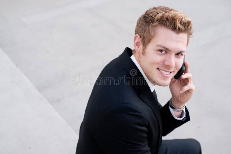 Businessman on cell phone royalty free stock photography