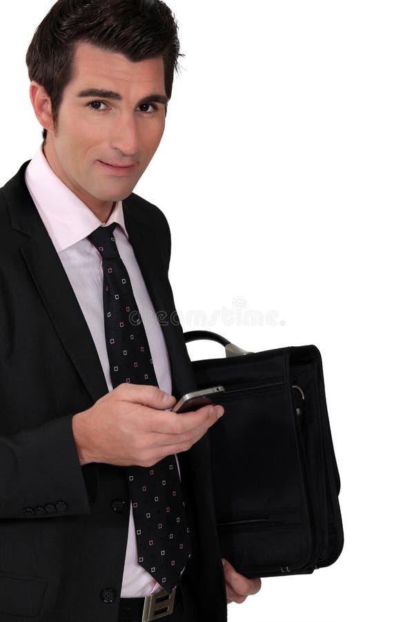Businessman with a cellphone stock image