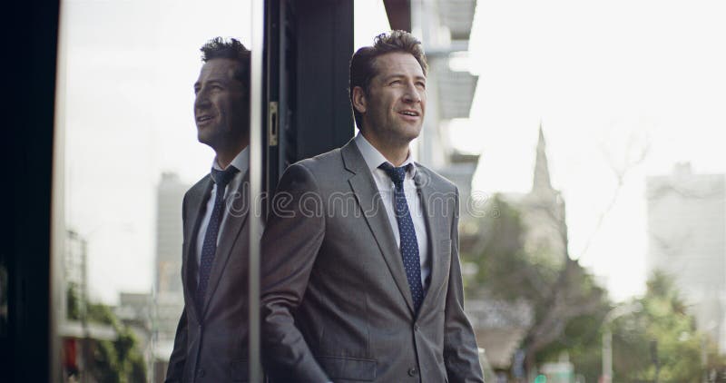 Businessman, ceo and thinking with balcony in real estate agency for ideas, planning and company. Developer royalty free stock photo