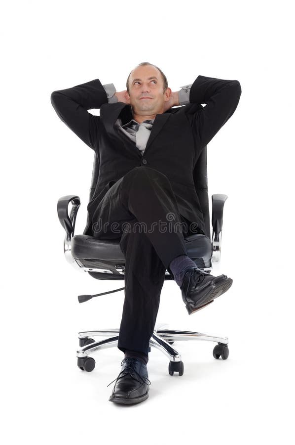 Businessman leaning back relax on a office swivel chair. Businessman leaning back relax on a office swivel chair