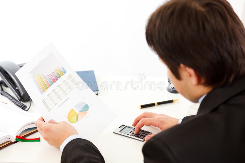 Businessman checking financial report royalty free stock photo Businessman checking financial report royalty free stock photo