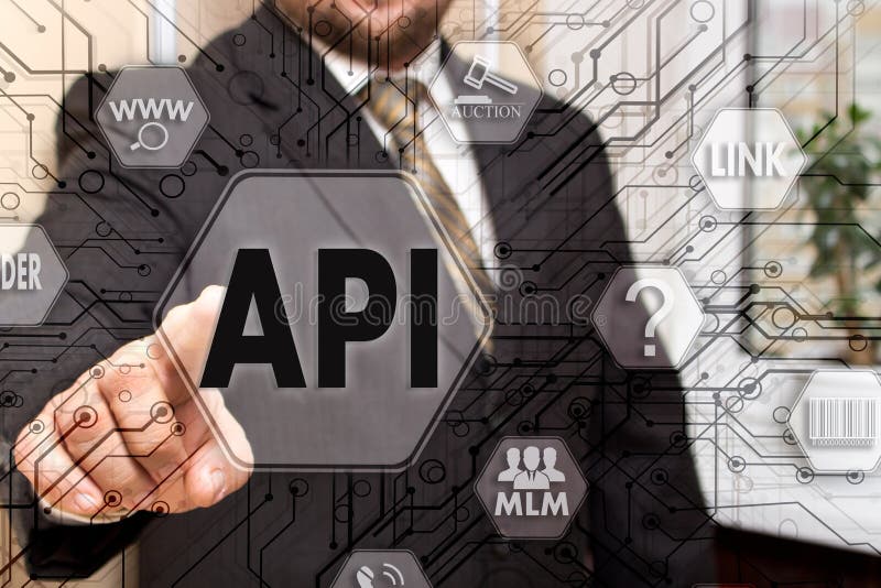 The businessman chooses the API, Application Programming Interface on a touch screen. Concept API royalty free stock photography The businessman chooses the API, Application Programming Interface on a touch screen. Concept API royalty free stock photography