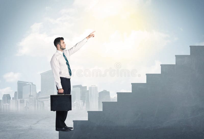 Businessman climbing up a concrete staircase concept royalty free stock images Businessman climbing up a concrete staircase concept royalty free stock images