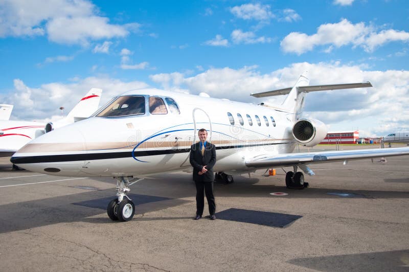Businessman at Corporate Jet stock image