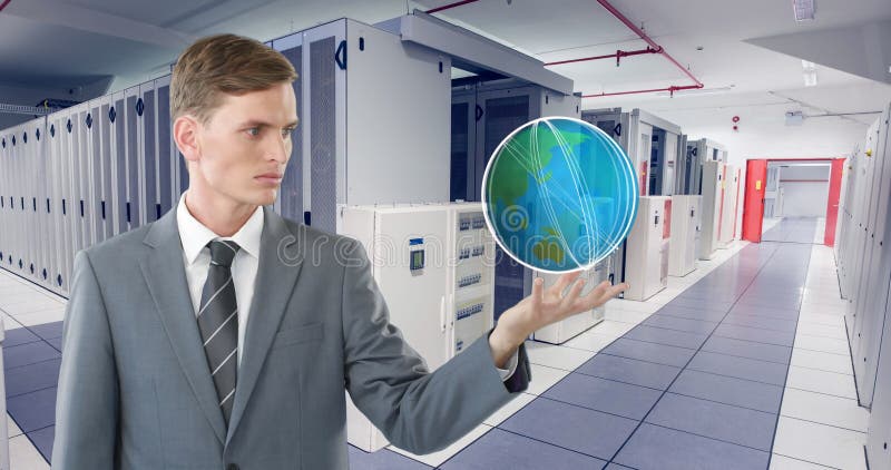 Businessman in data center holding digital globe, symbolizing global connectivity stock photography