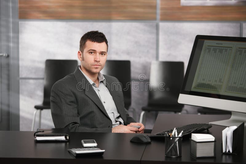 Businessman at desk stock photo. Image of collar, copyspace 12865372