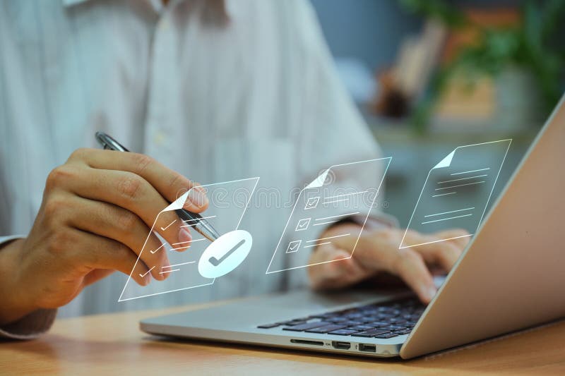 Businessman with a Document Management System (DMS). Streamline online docs, enhance file control & workflow efficiency with e- stock photos