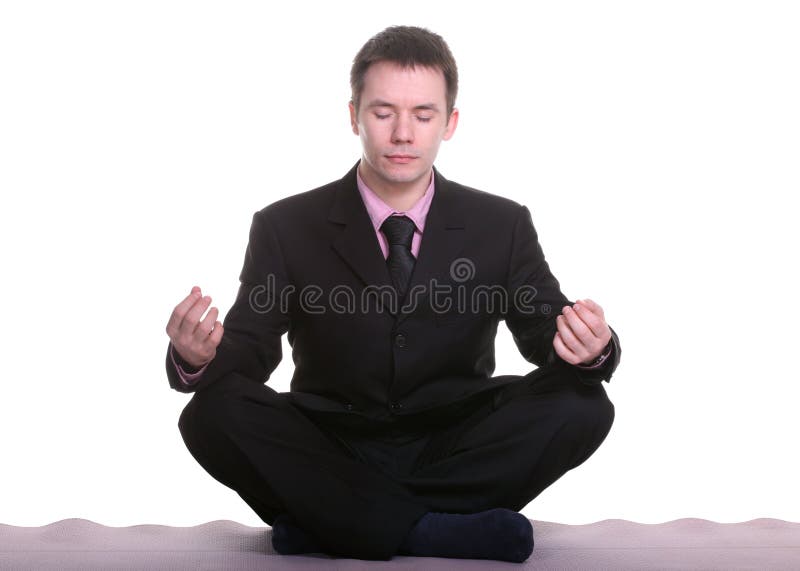 Businessman doing yoga