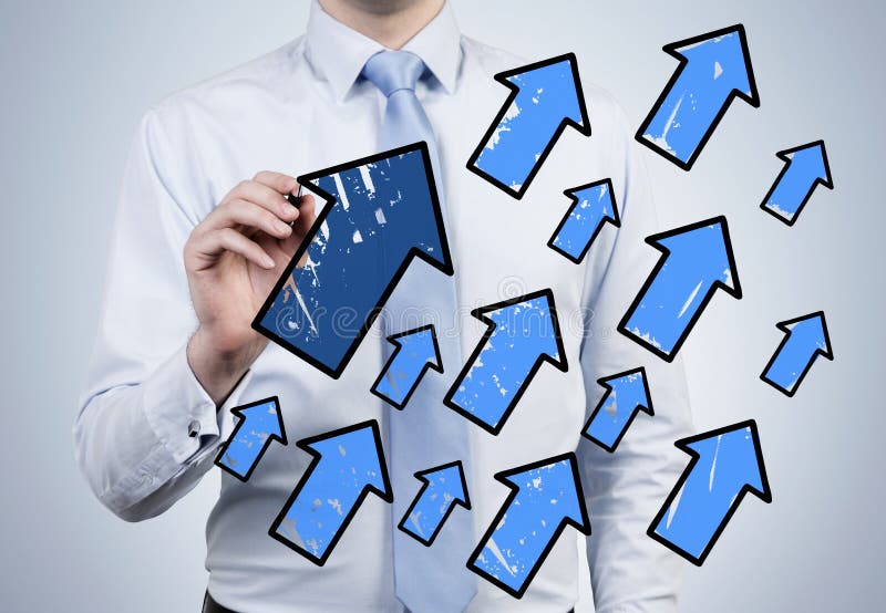 Businessman drawing arrows stock image. Image of height - 49507219