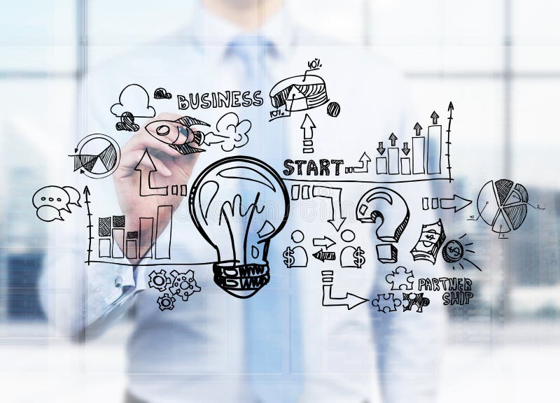A businessman is drawing a business flowchart on the glass screen. stock photography A businessman is drawing a business flowchart on the glass screen. stock photography