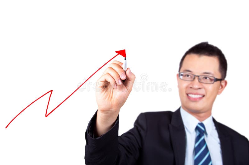 Businessman drawing profit graph