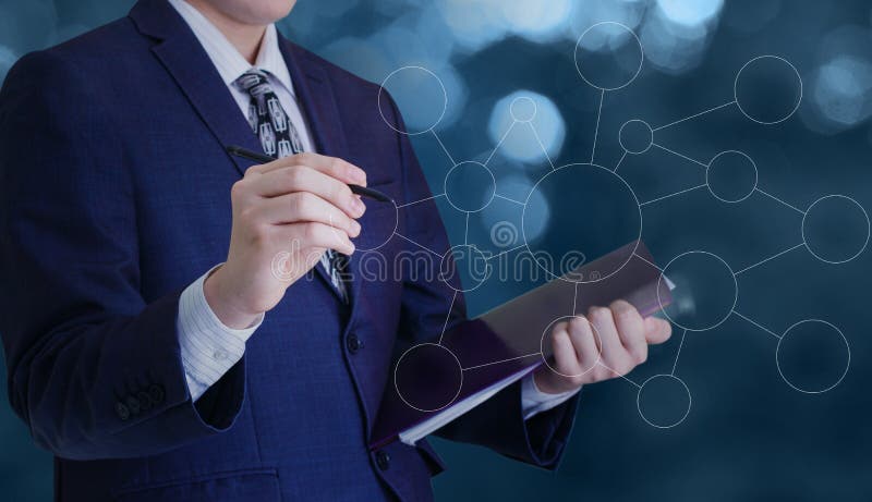 Businessman draws the structure of the business network. royalty free stock photography