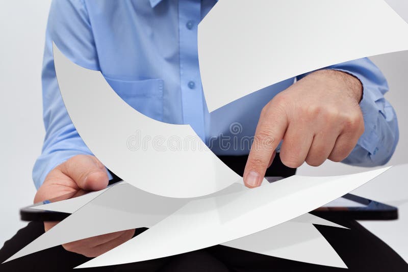 Businessman editing electronic documents concept