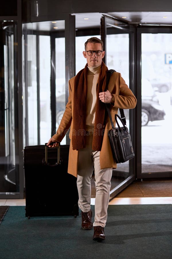 Businessman in Elegant Coat Drag Luggage or Suitcase Walking To the ...