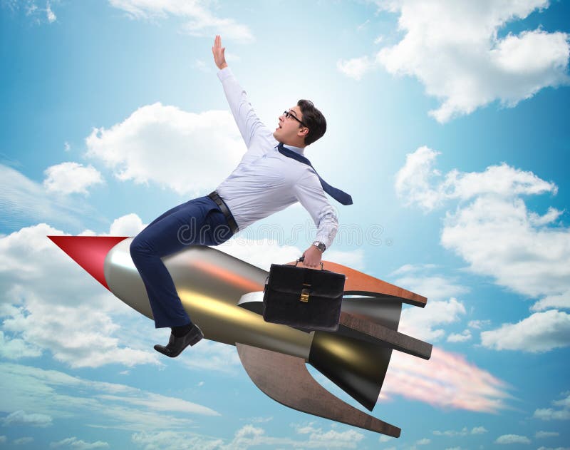 Businessman flying on rocket in business concept stock photo Businessman flying on rocket in business concept stock photo