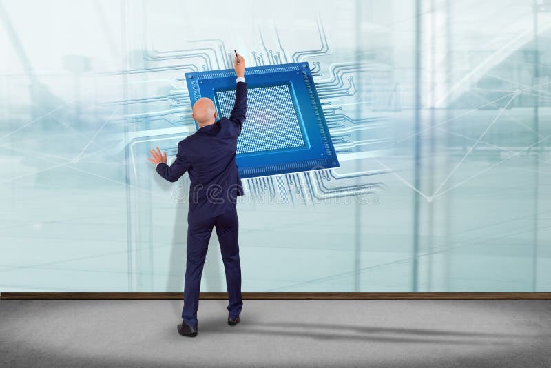 Businessman in front of a wall with a Processor chip and network royalty free stock image