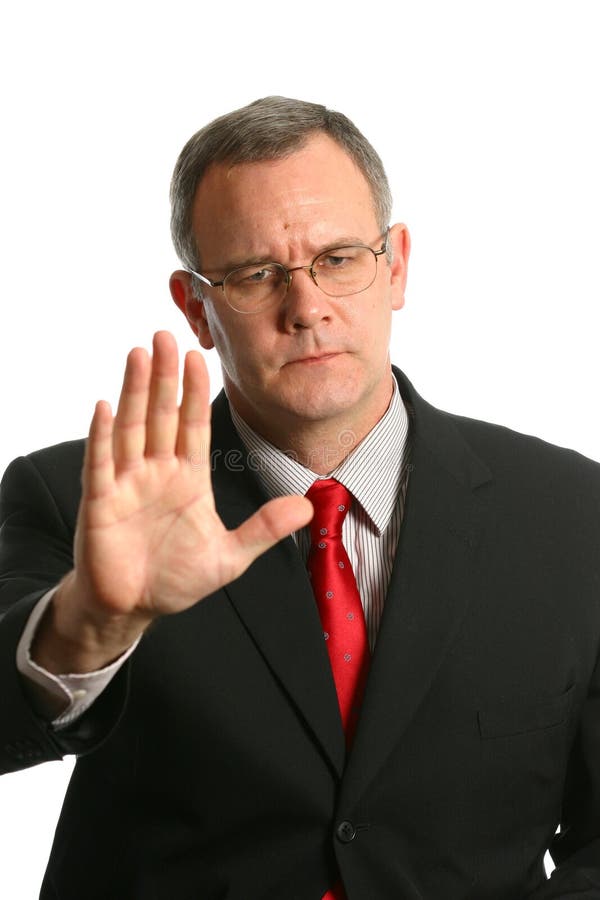 Businessman in gesturing for someone to stop
