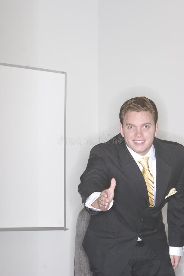 Businessman giving handshake