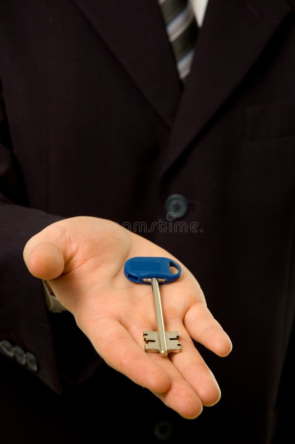 Businessman is giving you a key