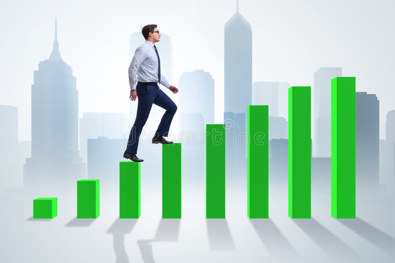 The businessman going up the bar chart in growth concept