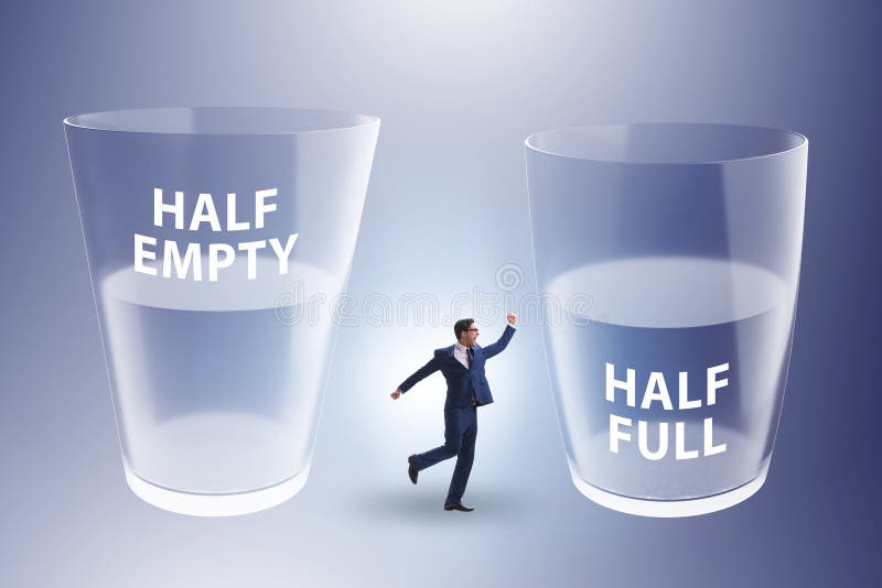 Businessman in Half Empty Half Full Glass Concept Stock Photo Image