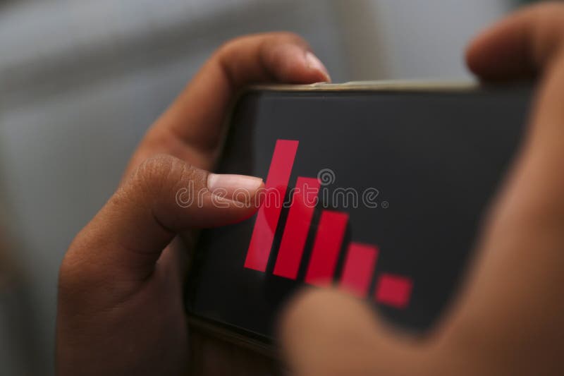 Businessman han showing decrease graph on smartphone. Use for layout design background. Decrease image stock images, royalty-free photos and pictures