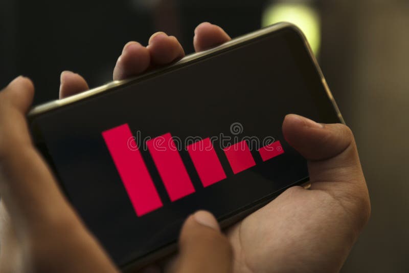 Businessman han showing decrease graph on smartphone. Use for layout design background. Decrease image stock images, royalty-free photos and pictures