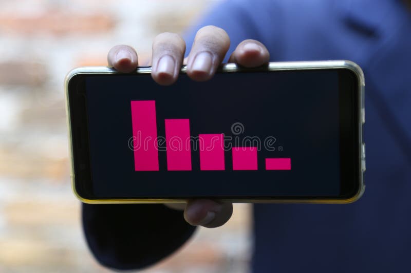 Businessman han showing decrease graph on smartphone. Use for layout design background. Decrease image stock images, royalty-free photos and pictures