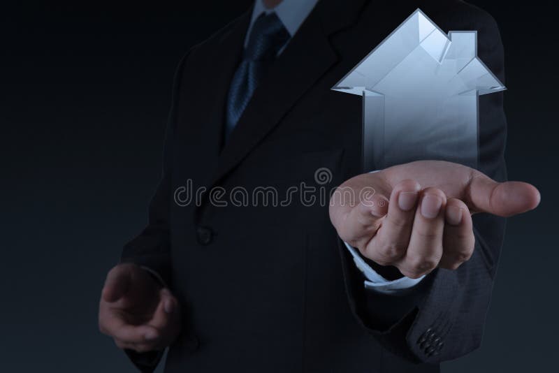 Businessman hand holding 3d house as insurance stock photos Businessman hand holding 3d house as insurance stock photos