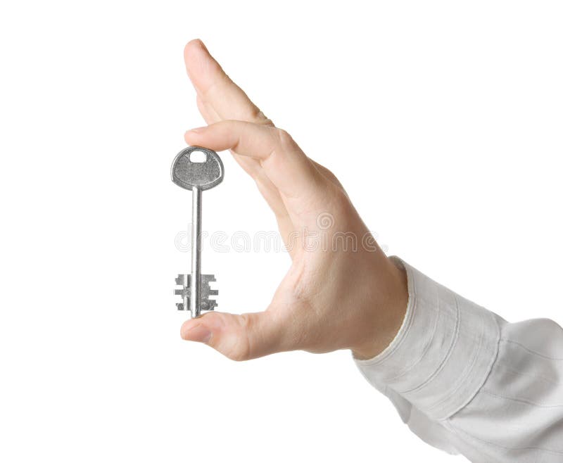 Businessman hand, holding key isolated