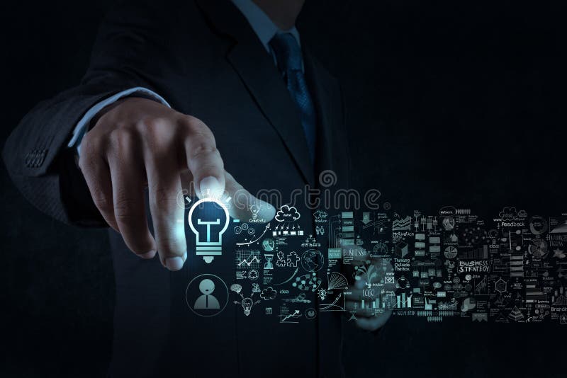 Businessman hand touch light bulb sign and business strategy royalty free stock photography