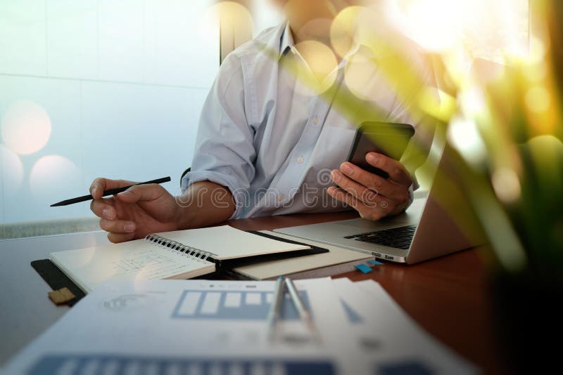 Businessman hand working with new modern computer and business royalty free stock photo