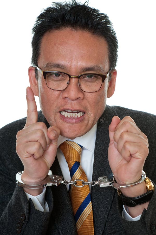 Businessman with handcuffs