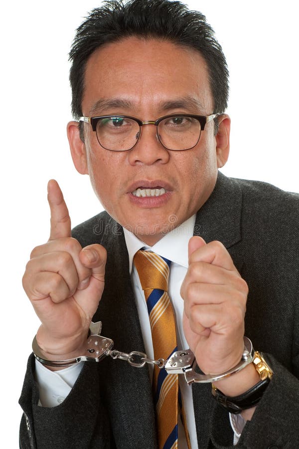 Businessman with handcuffs