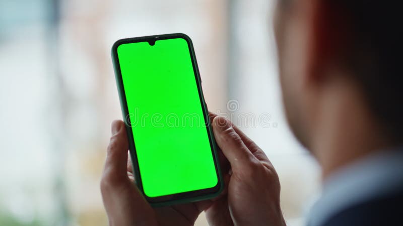 Businessman hands holding greenscreen cellphone at office workplace closeup. stock video footage