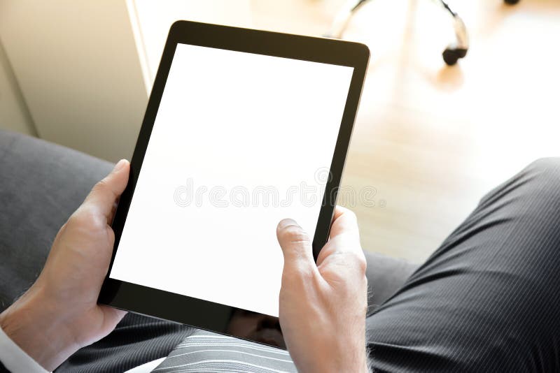 Businessman hands holding tablet computer