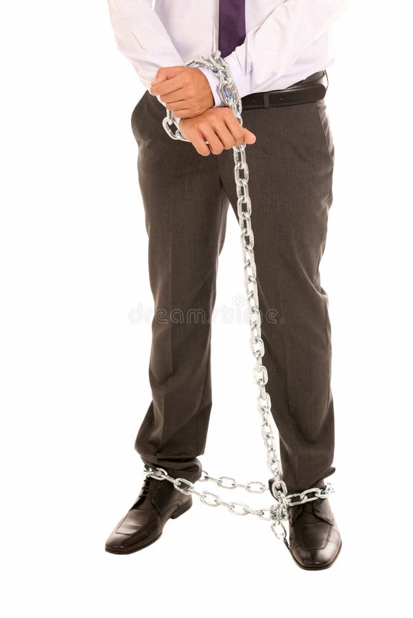 Businessman hands and legs chain, job slave symbol