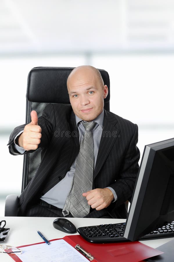Businessman at his desk in the office. royalty free stock photos