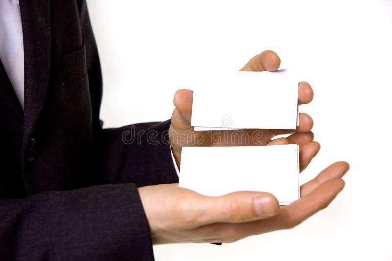 Businessman holding blank business cards