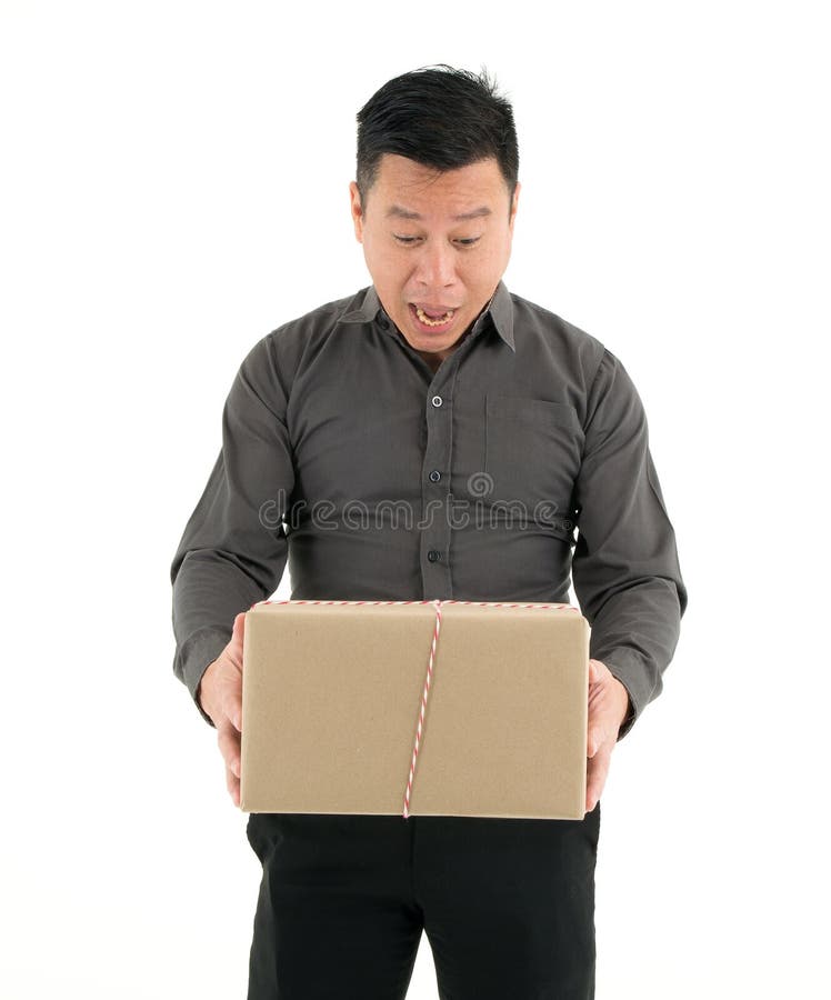 Businessman Holding Cardboard Box Isolated On White Background stock images Businessman Holding Cardboard Box Isolated On White Background stock images