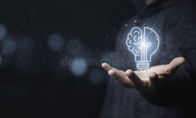 Businessman holding half of virtual lightbulb and brain on blue bokeh background , Smart thinking idea and inspiration innovation. Concept