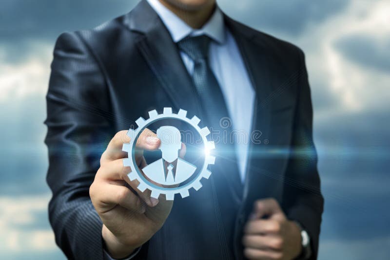Businessman holding icon of the worker . royalty free stock image Businessman holding icon of the worker . royalty free stock image