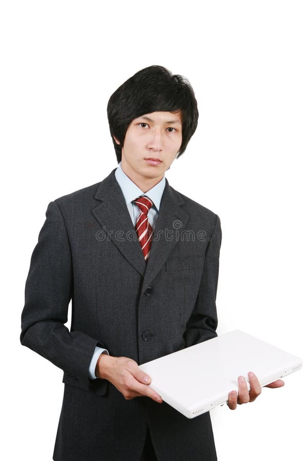 Businessman holding laptop