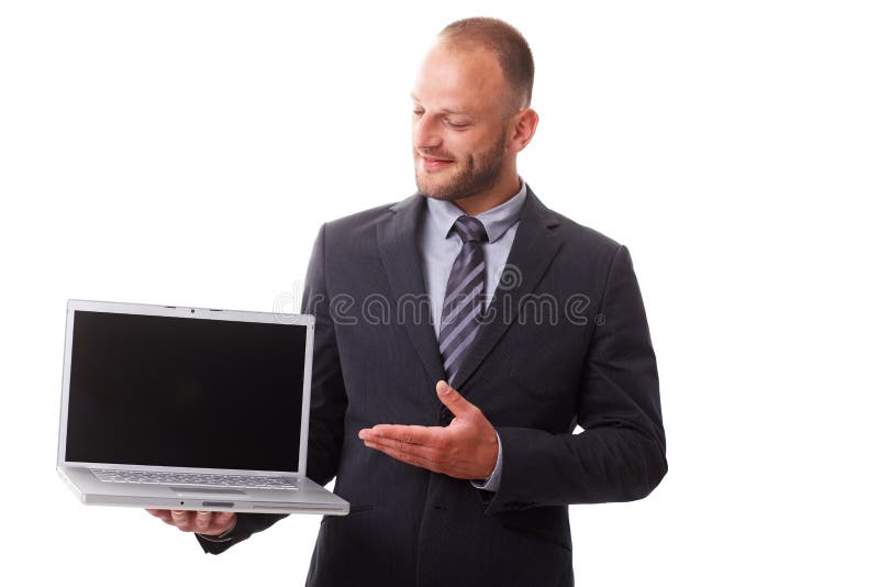 Businessman holding laptop with blank screen stock image Businessman holding laptop with blank screen stock image