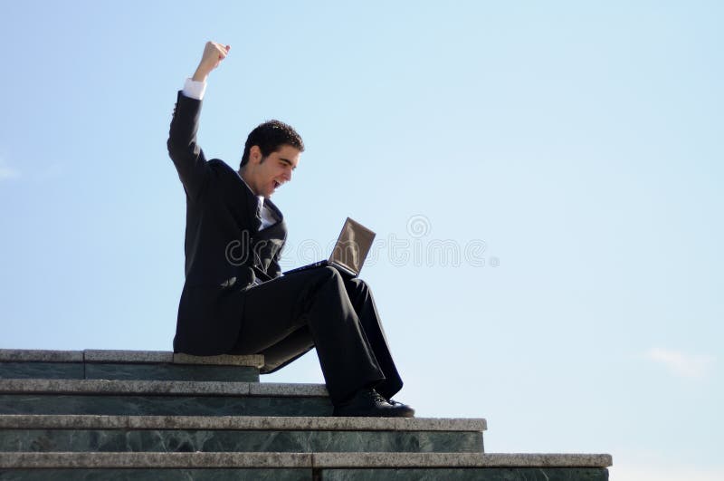 Businessman holding a laptop computer