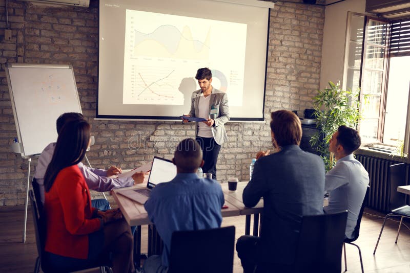 Businessman holding lecture for success in business stock photos Businessman holding lecture for success in business stock photos