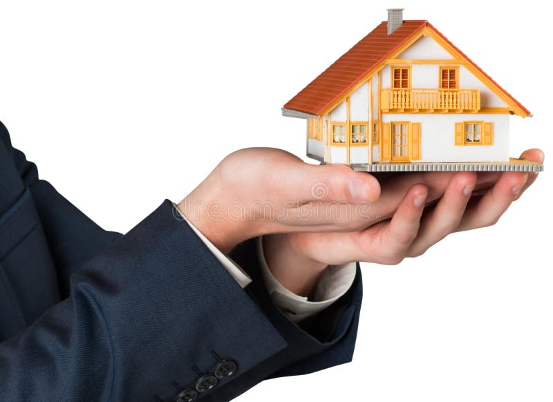 Businessman holding miniature house model royalty free illustration Businessman holding miniature house model royalty free illustration