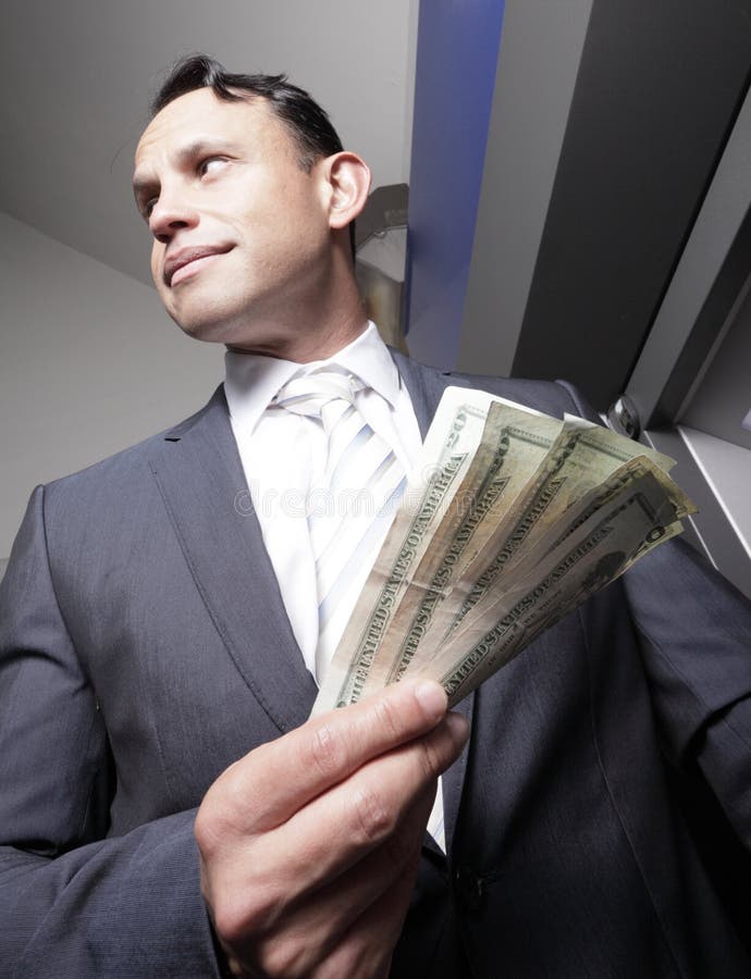 Businessman holding money stock images Businessman holding money stock images